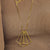 Women's Necklace Hanging Tripod made with Sterling Silver Gold Plated