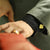 Man's Hand wearing The Spade Gold Polished Cufflinks for Poker Players